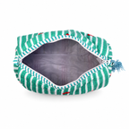 A green and white striped zippered pouch with a gray interior lining and a small blue tassel charm on the zipper, shown on a white background.