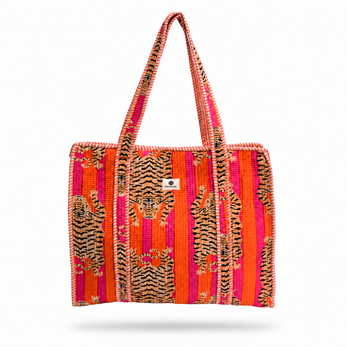 A woven tote bag featuring a vibrant pattern of tiger prints and vertical stripes in orange, pink, and red, with a small white brand tag in the center.