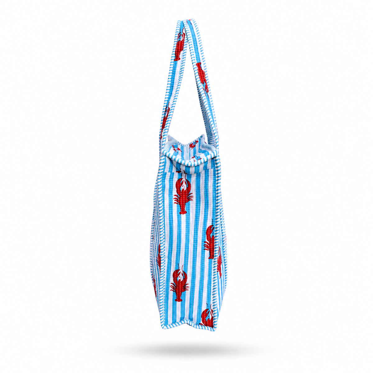 A fabric tote bag with a light blue and white vertical stripe pattern and red lobster motifs, shown against a plain white background.