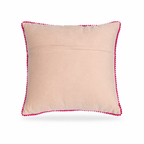 The backside of  a square decorative throw pillow with a vibrant floral embroidery design on a light beige background, finished with a bright pink pom-pom trim, shown against a plain white background.