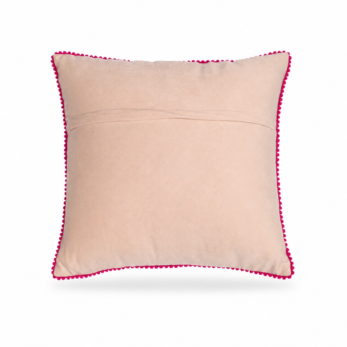 The backside of  a square decorative throw pillow with a vibrant floral embroidery design on a light beige background, finished with a bright pink pom-pom trim, shown against a plain white background.