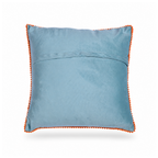 The backside of a  square decorative throw pillow featuring an embroidered black dachshund wearing a colorful floral crown on a light blue background, finished with an orange pom-pom piped edge.