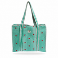 A green and white striped tote bag with small red hearts and striped trim, shown on a plain white background.