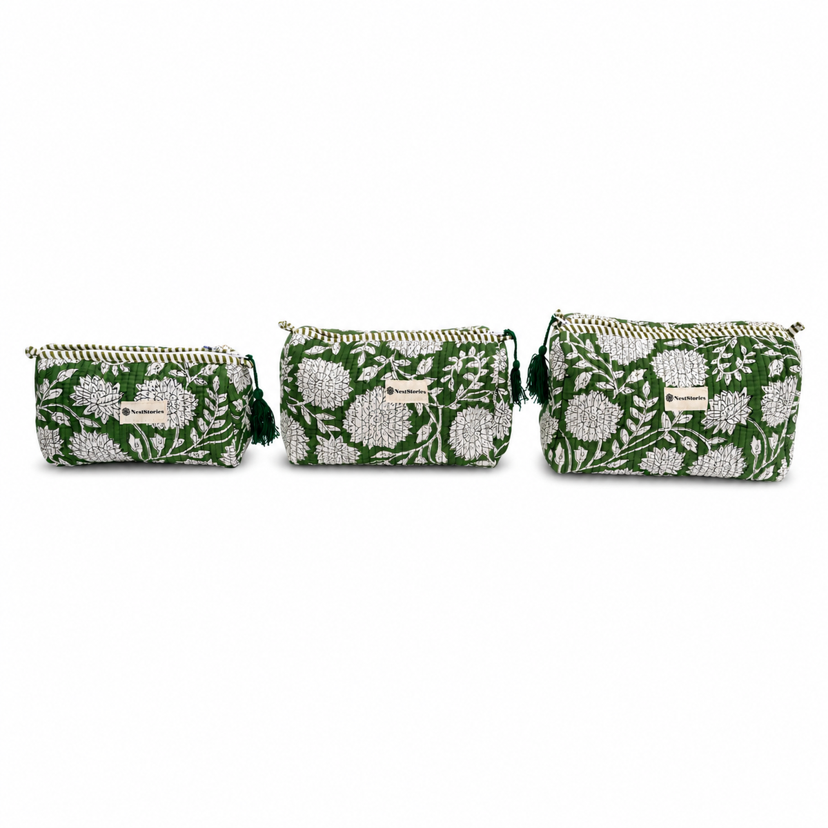 Three small zip pouches in a matching green and white floral pattern, arranged in ascending size order against a plain white background.