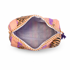 An open zippered cosmetic pouch with a multicolor patchwork design featuring peach, purple, black, and orange patterns, set against a plain white background.