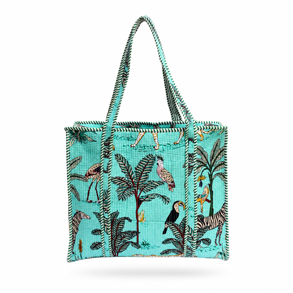 A turquoise tote bag with a tropical print featuring palm trees, toucans, zebras, and birds, finished with black and turquoise braided handles and trim, shown on a white background.