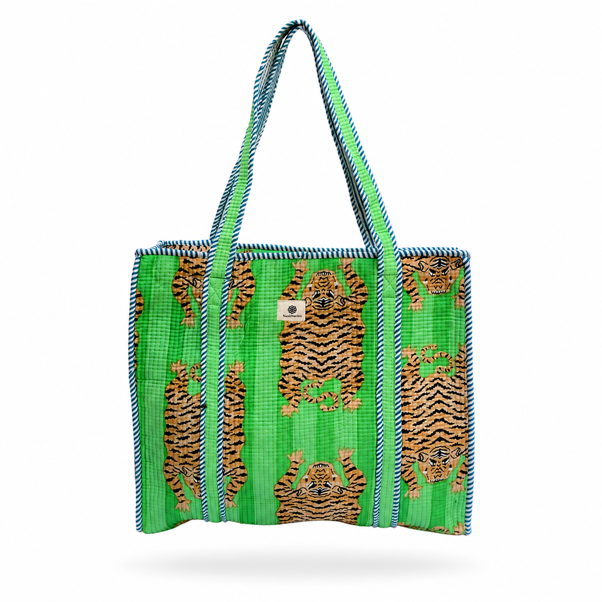 A woven tote bag featuring a bright green background with vertical panels of brown and black tiger print, accented by blue and white zigzag trim and matching handles.