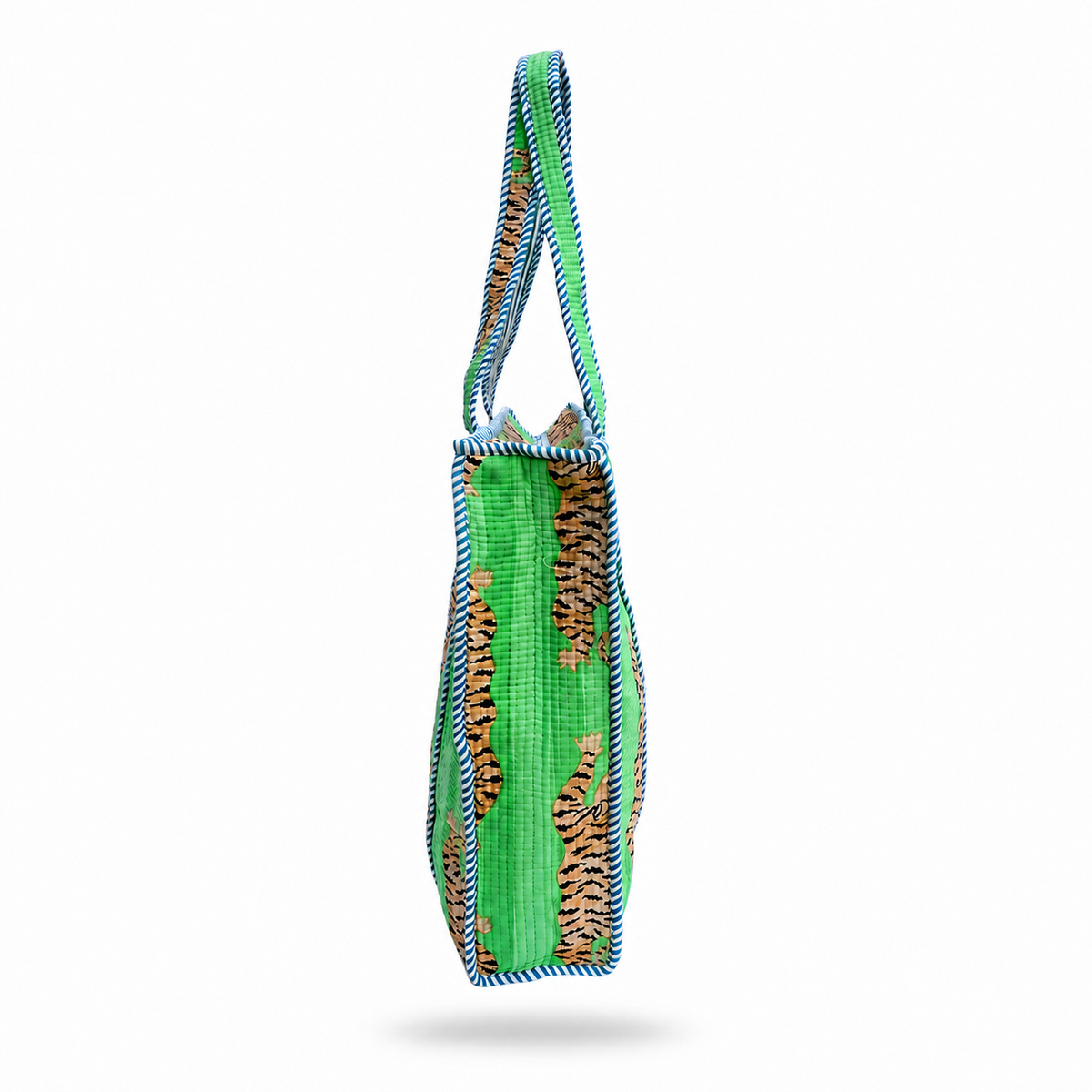 A green woven tote bag with vertical brown and black tiger stripes and blue-and-white striped trim, shown against a plain white background.
