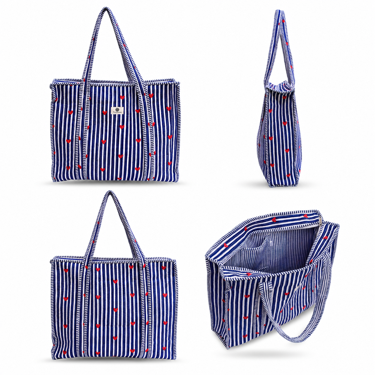 A striped tote bag shown from multiple angles on a white background. The bag has a blue and white vertical stripe pattern with small red embroidered motifs and blue-and-white striped handles.
