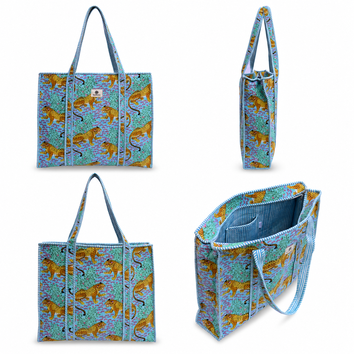 A tote bag shown from multiple angles on a white background, featuring a blue and turquoise background with a pattern of golden lions and a small white square logo patch on the front.